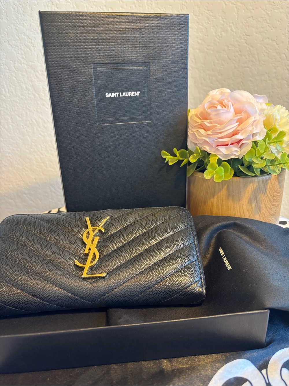 Authentic Saint Laurent Black Quilted Zippy Wallet with Gold YSL Emblem